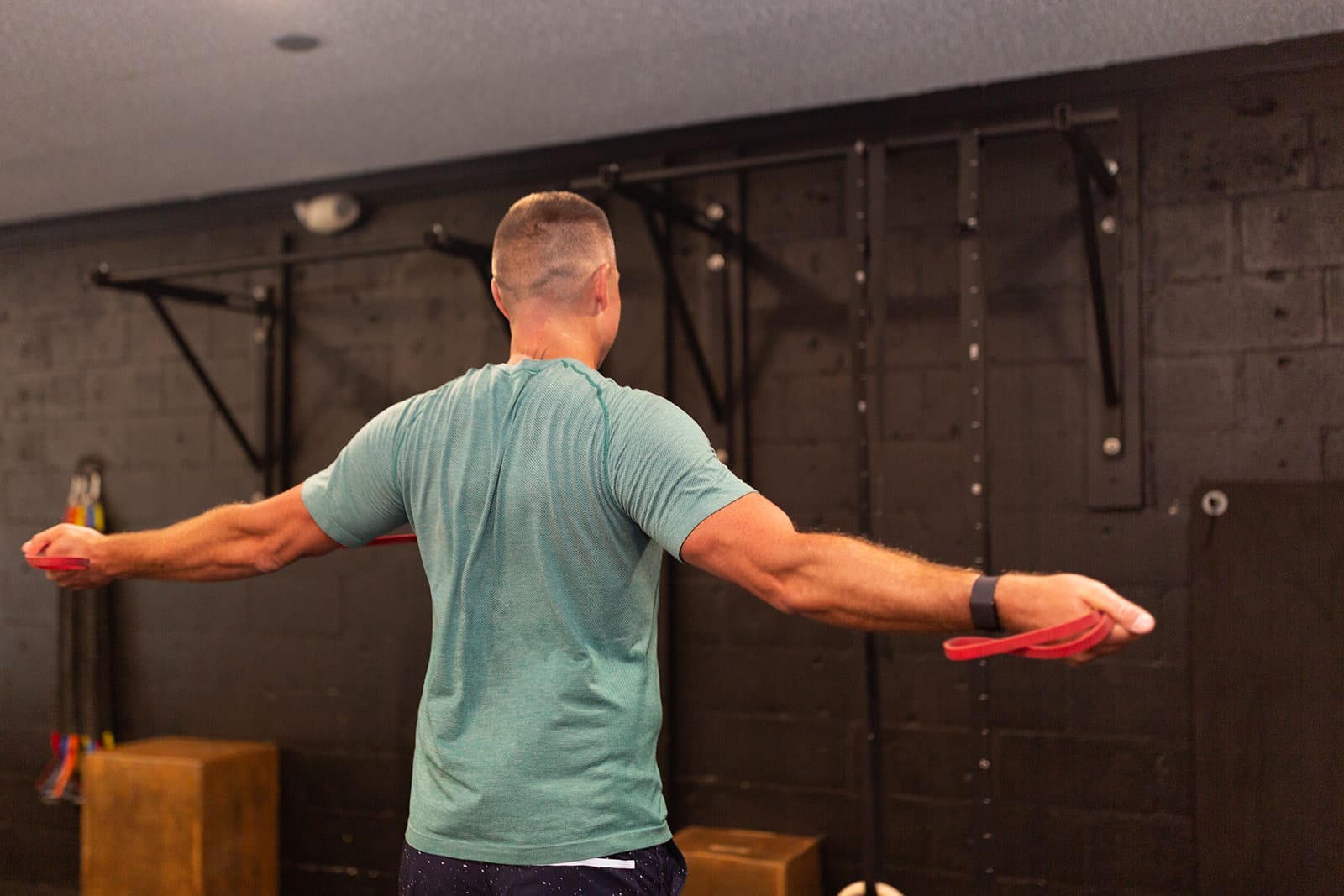 Man lifting weights during personal training session